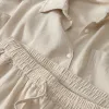A beige shirt paired with beige wide-leg pants set for women's casual commuting looks slimming and drooping Application Scenario